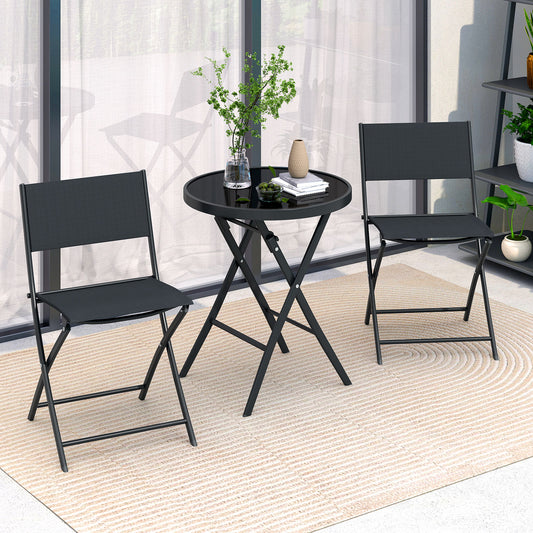 The patio dining furniture set on a balcony with a glass door in the background