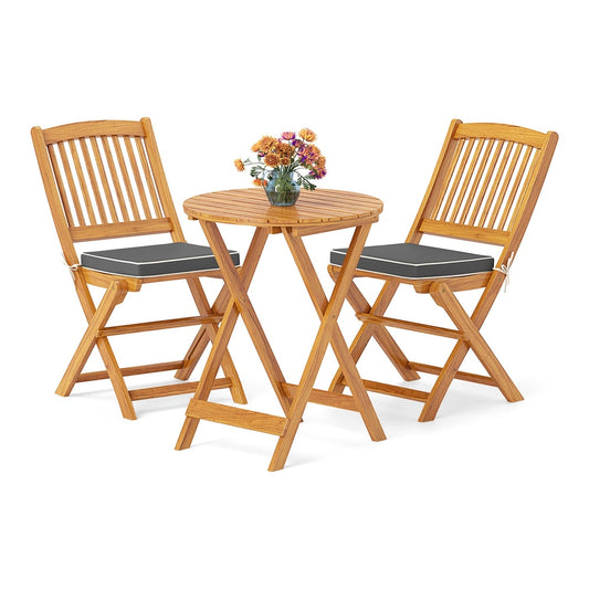 3 Piece Folding Bistro Set with Cushions shown on a plain white background with a flower vase