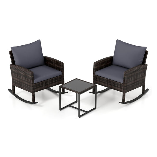 3-Piece Wicker Rocking Bistro Set with grey cushions and a glass topped table