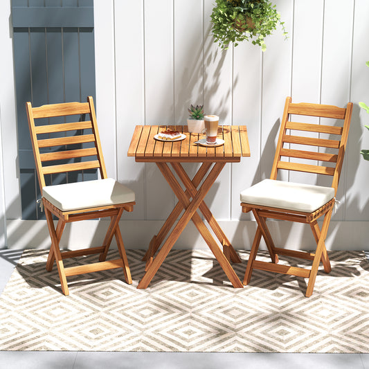The patio furniture set on a rug with a white slatted wall behind