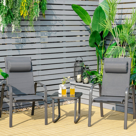 The grey patio bistro set with coffee table and two chairs on a wooden deck outdoors
