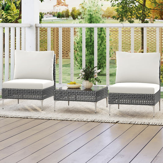 The patio furniture set placed on a wooden porch with a vase of flowers on the coffee table