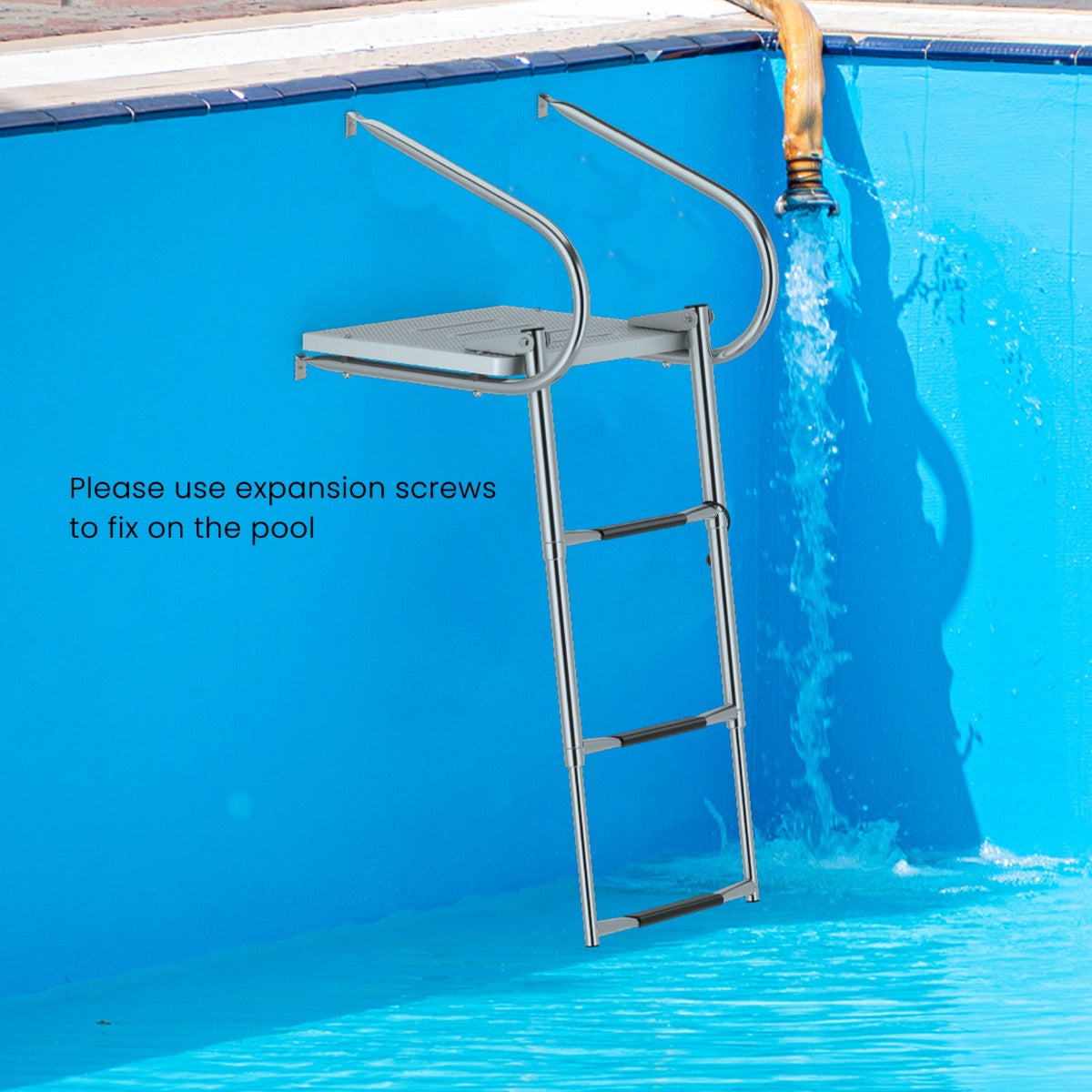 The boat ladder mounted to the side of a blue swimming pool with water flowing