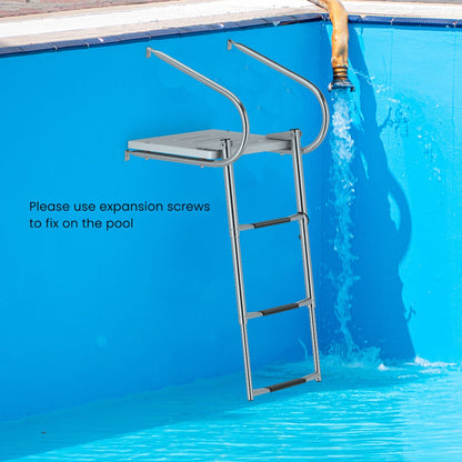 The boat ladder mounted to the side of a blue swimming pool with water flowing