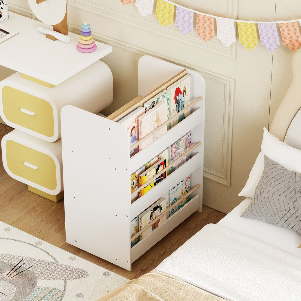 White kids bookshelf with wheels placed next to a bed in a child's bedroom