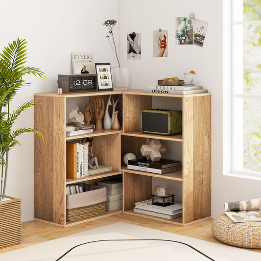 The natural wood corner bookcase is shown in a room setting with plants and decorative items