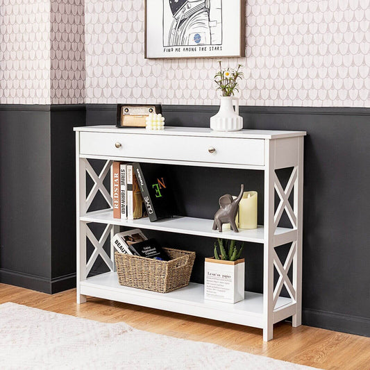 The console table styled with books and decorative items in a modern living room setting