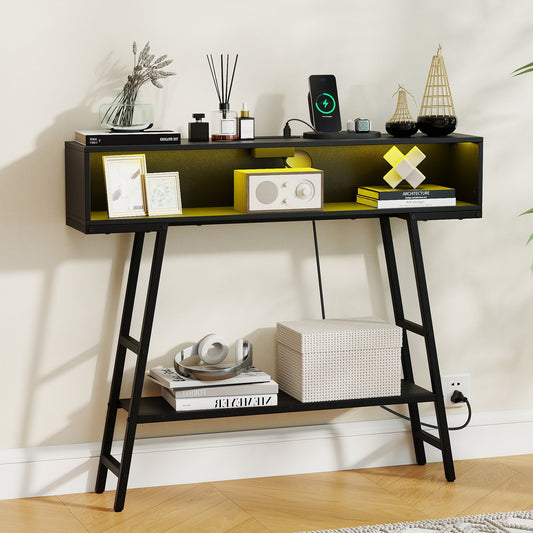 The console table placed against a wall with various decorative items and a wireless charger