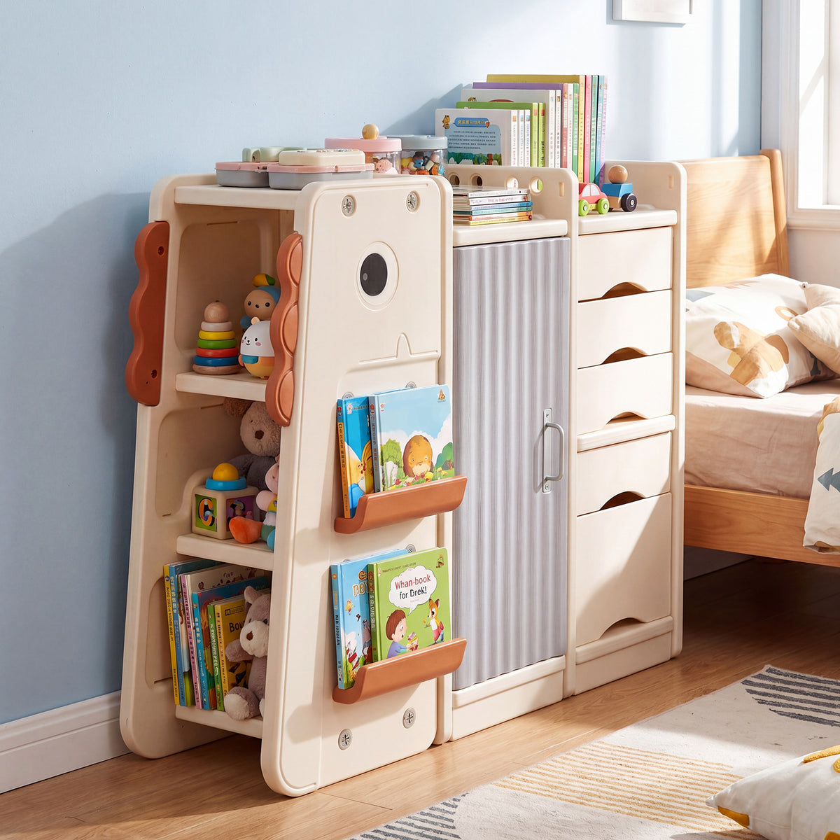 The kids storage unit with dinosaur details, shelves on the left and drawers on the right