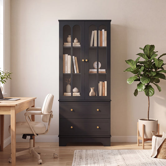 The black display cabinet in a home office setting, filled with books and decorative items