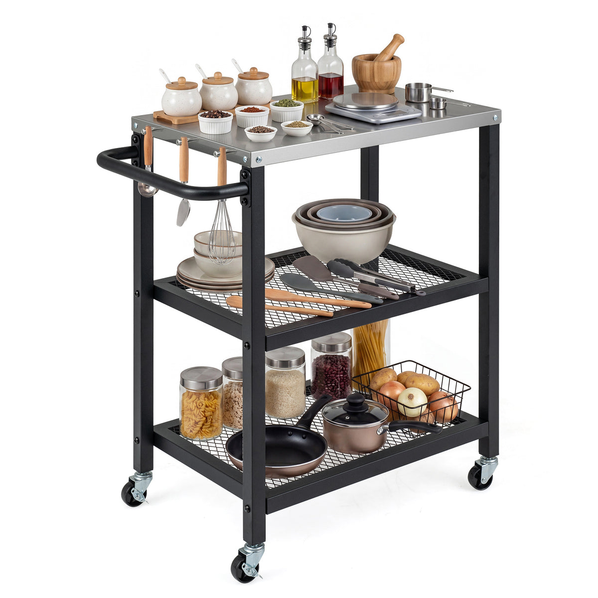 The kitchen island cart with a stainless steel top, loaded with food and cookware