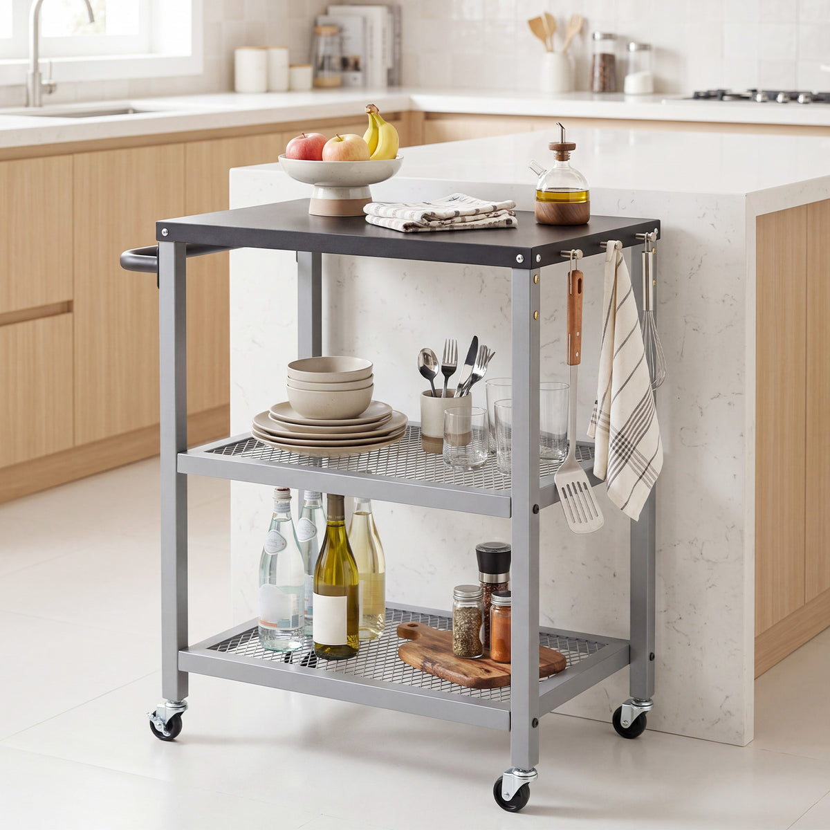 The kitchen island cart is shown with a tabletop, two shelves, and wheels, stocked with kitchenware