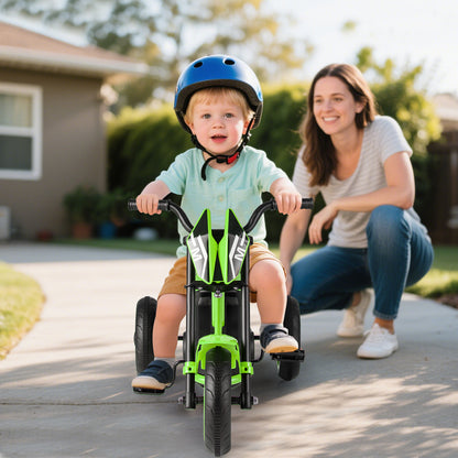 the toddler bike being ridden by a young boy wearing a blue helmet on a driveway