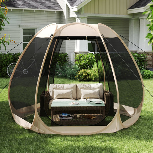 The screened camping tent gazebo set up on grass with outdoor furniture inside