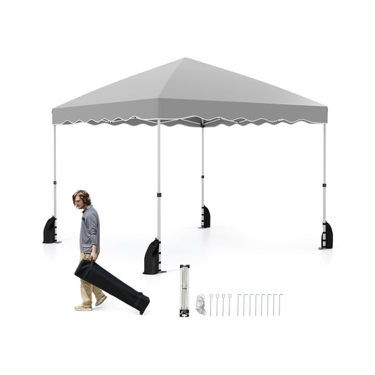 Pop up Canopy Tent with Wheeled Bag, grey, with a man holding a bag and tent parts laid out