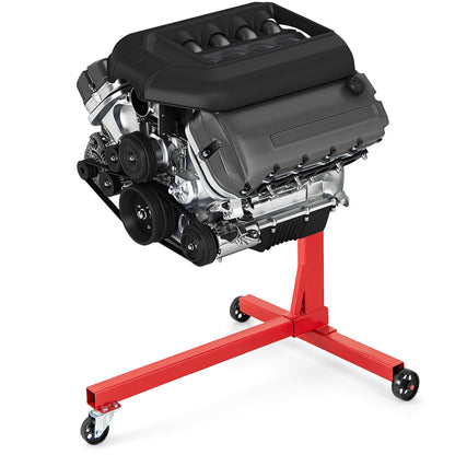Close-up of a car engine mounted on a red engine stand