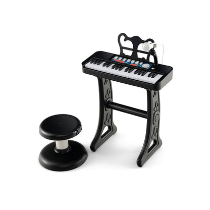 37-Key Kids Piano Keyboard Electronic Instrument with Microphone in black with a stool and music stand