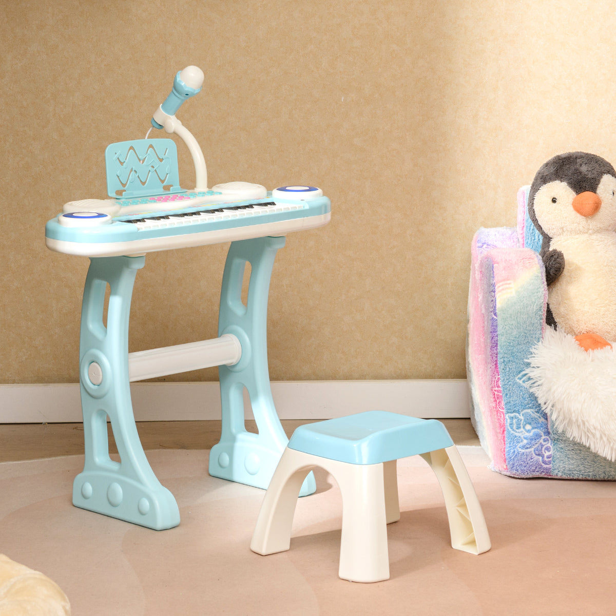 The blue kids electric piano with stool in a room setting