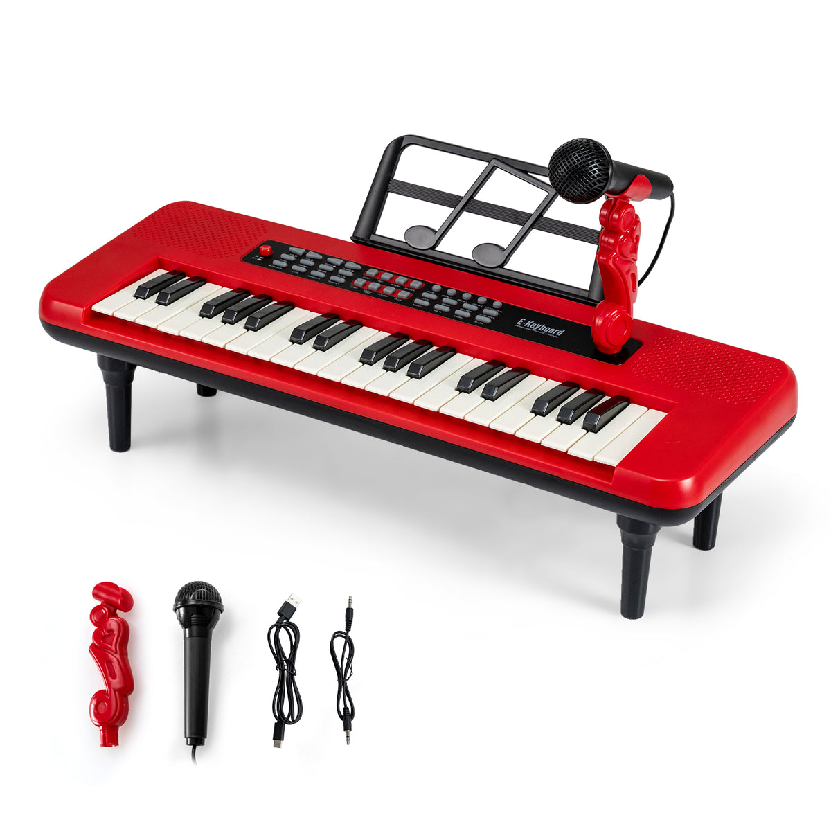The kids piano keyboard shown with its microphone and various connection cables