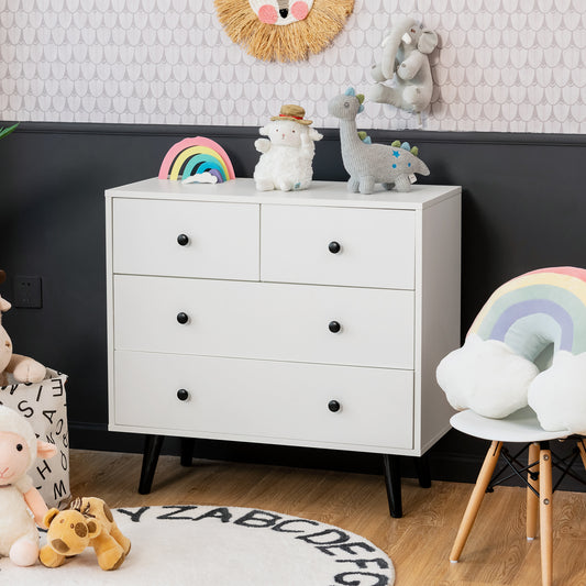 The white storage chest in a child's room with toys and decorations