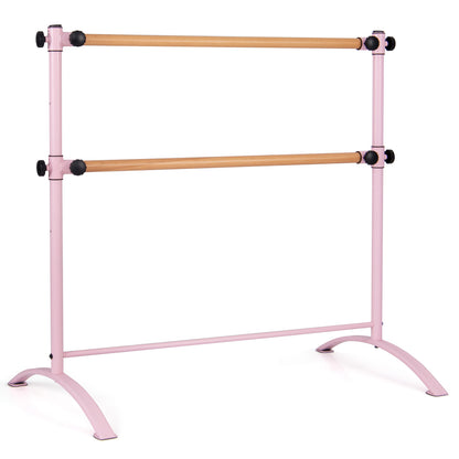 The pink freestanding ballet barre with two wooden bars