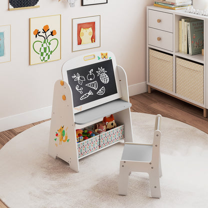 The art easel with a blackboard showing fruit drawings and a grey chair