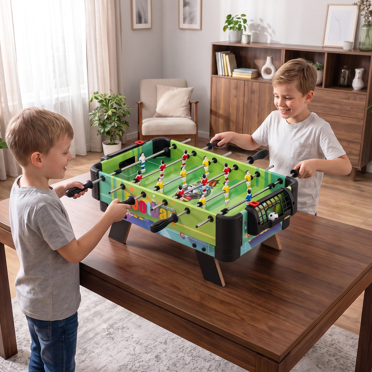 Two children playing the football game on the combo table set