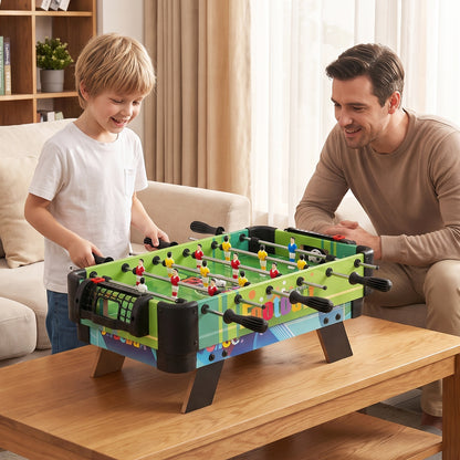 Father and son playing the football game on the combo table set