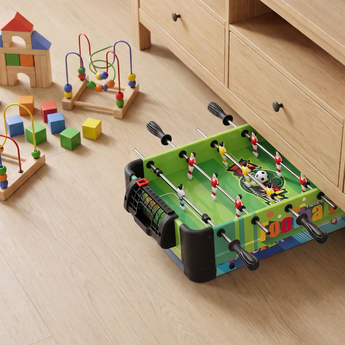 The combo game table set on a wooden floor with children's toys