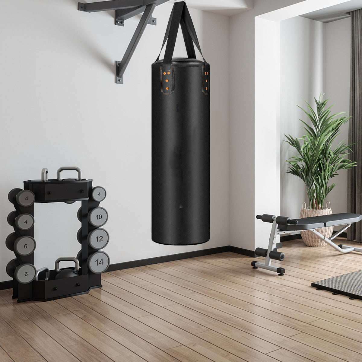 The boxing bag suspended in a room with wooden flooring and gym equipment
