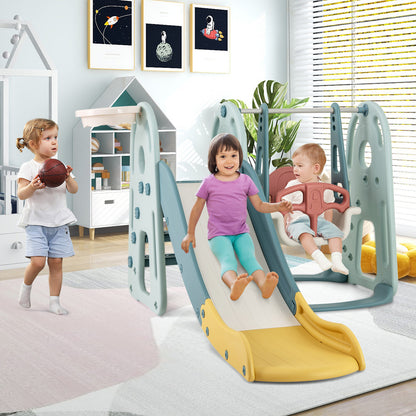 Children playing on the green and blue kids slide and swing set indoors