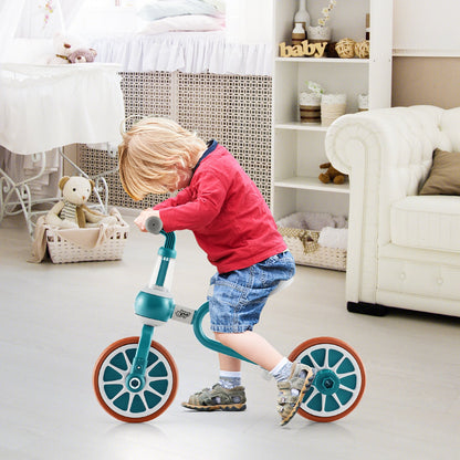 A young child riding the green balance toy inside a bright living room setting