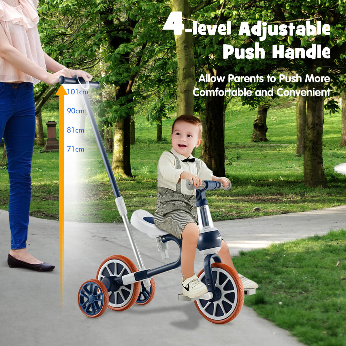 Parent pushing a toddler on the navy training trike, showing adjustable handle height