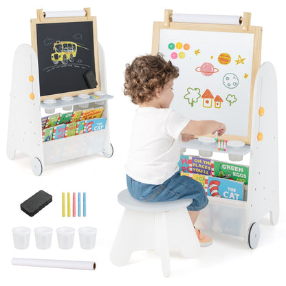 the activity table shown with a child sitting on the stool and various art supplies
