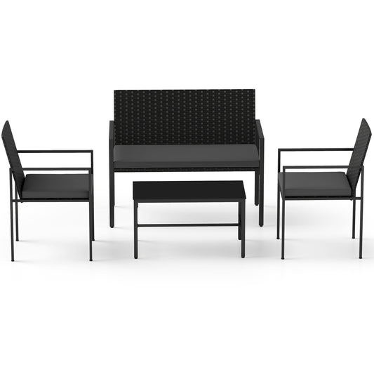 4-Piece Outdoor Rattan Chairs and Loveseat with Tempered Glass Coffee Table for Backyard-Grey set arranged on a patio