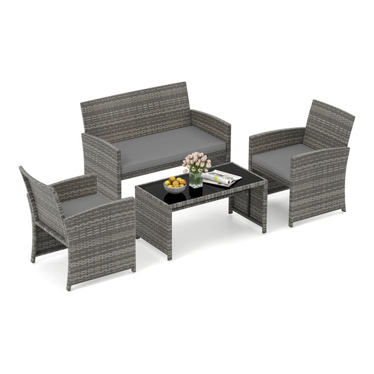 4 Piece Patio Conversation Set with grey rattan chairs, a loveseat and a glass topped coffee table