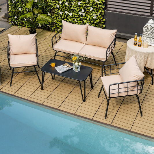 The patio furniture set arranged on a wooden deck beside a swimming pool