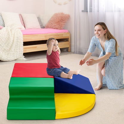 Mother and baby interacting on the colourful foam climbing blocks
