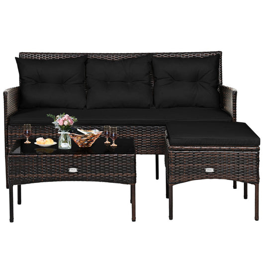 4 Seater Rattan Garden Furniture Set with Cushioned Sofa, a black three-seater sofa, a coffee table and an ottoman