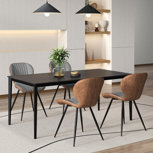 The dining chairs arranged around a black table in a modern dining room setting with pendant lights
