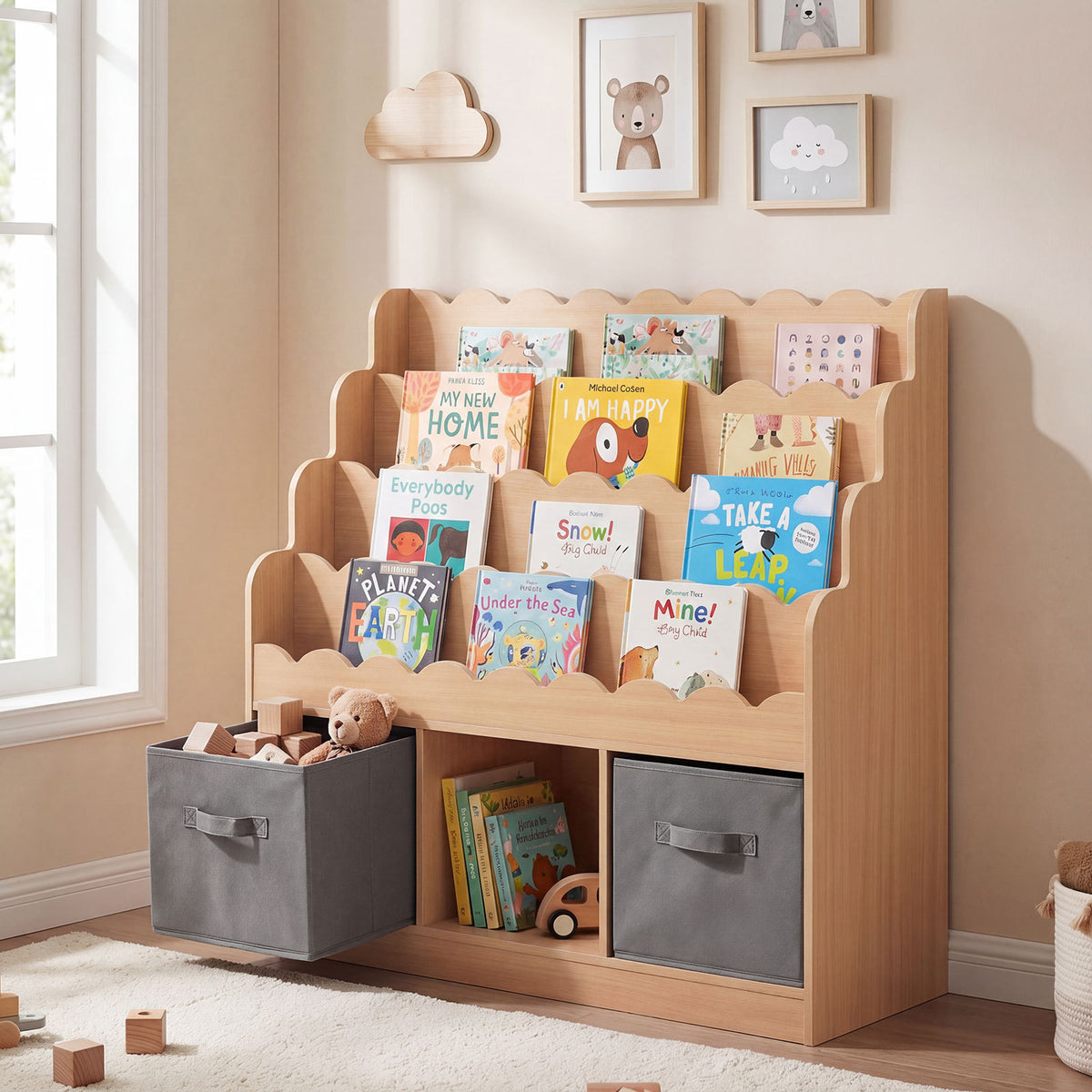 The kids storage unit with one fabric drawer pulled out to reveal books stored inside