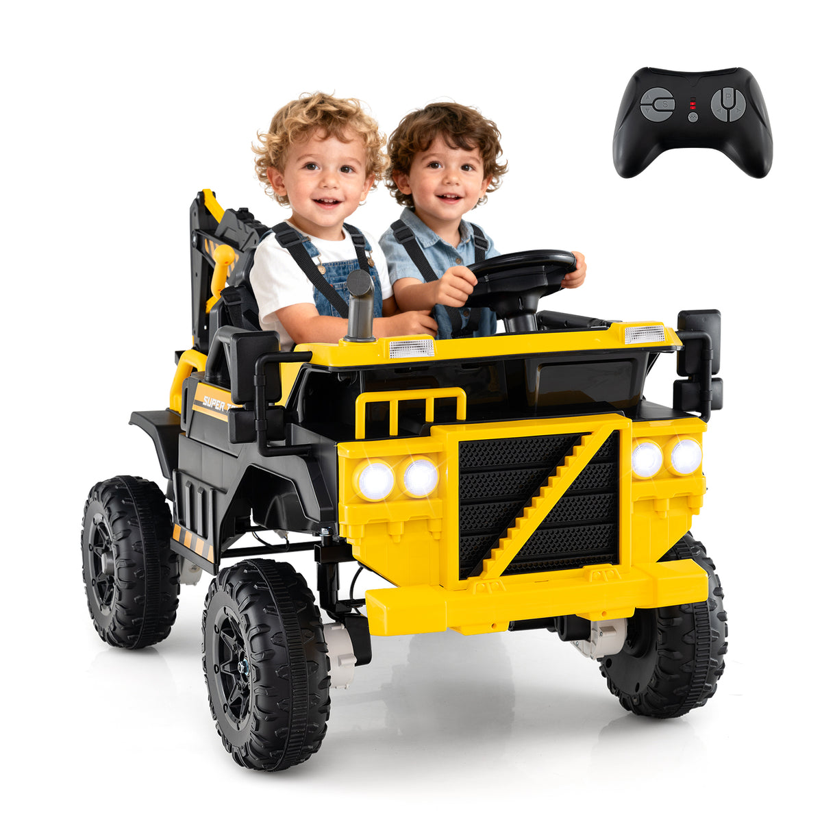 The construction vehicle with two children sitting inside and a remote control nearby