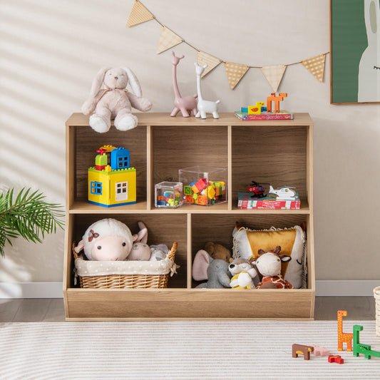 The kids storage unit placed in a bright room with toys on shelves and a rug on the floor