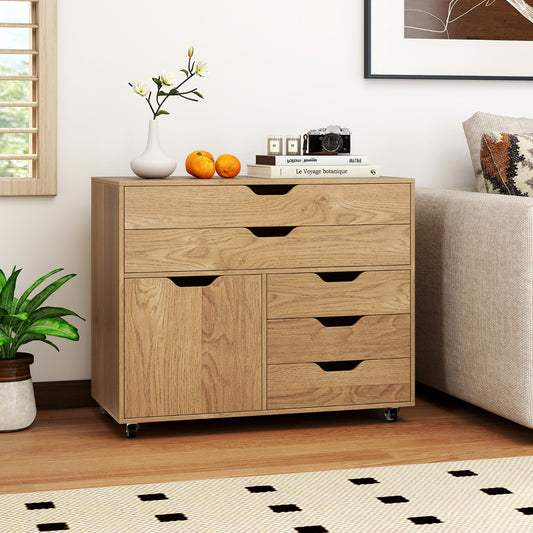 The natural wood cabinet with a door and drawers is shown in a living room setting next to a sofa