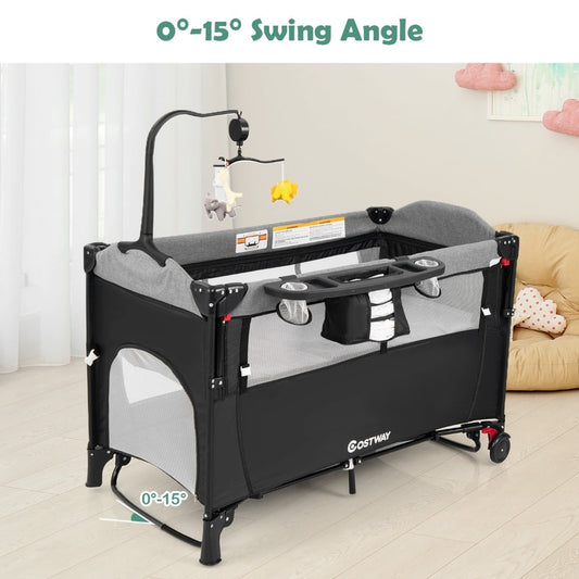 The bedside sleeper angled to show its rocking feature and side mesh panels