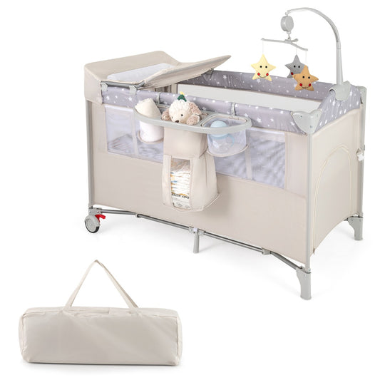 5-In-1 Baby Bassinet Crib Bedside Sleeper Nursery Center in beige with a changing mat and mobile