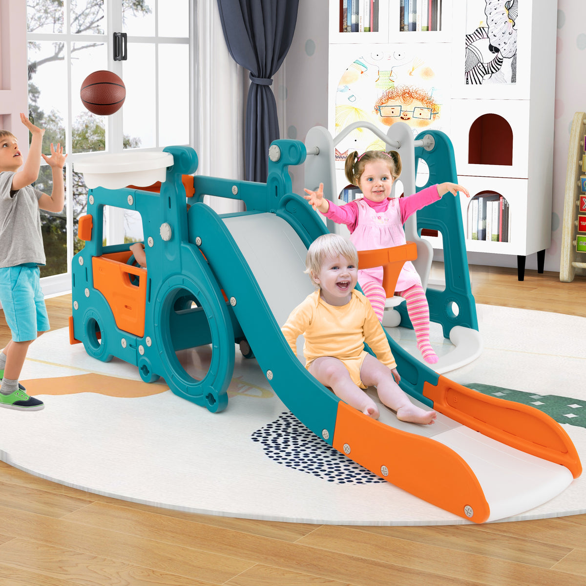 The kids slide and swing set being used by children playing indoors