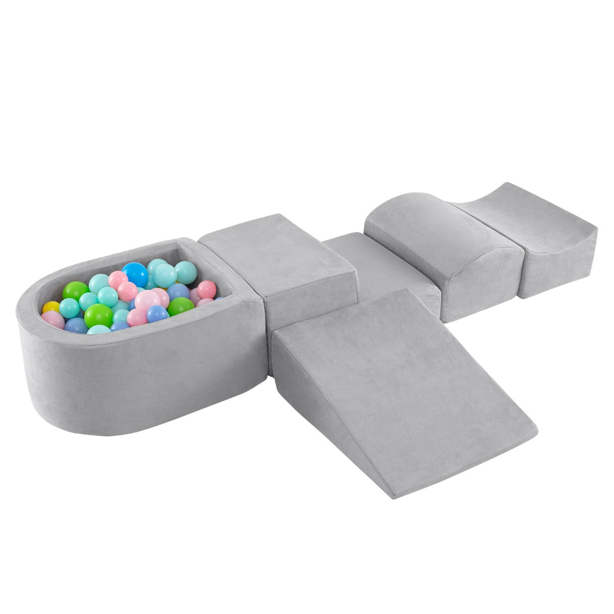 The soft play set featuring grey foam shapes and a collection of colourful plastic balls
