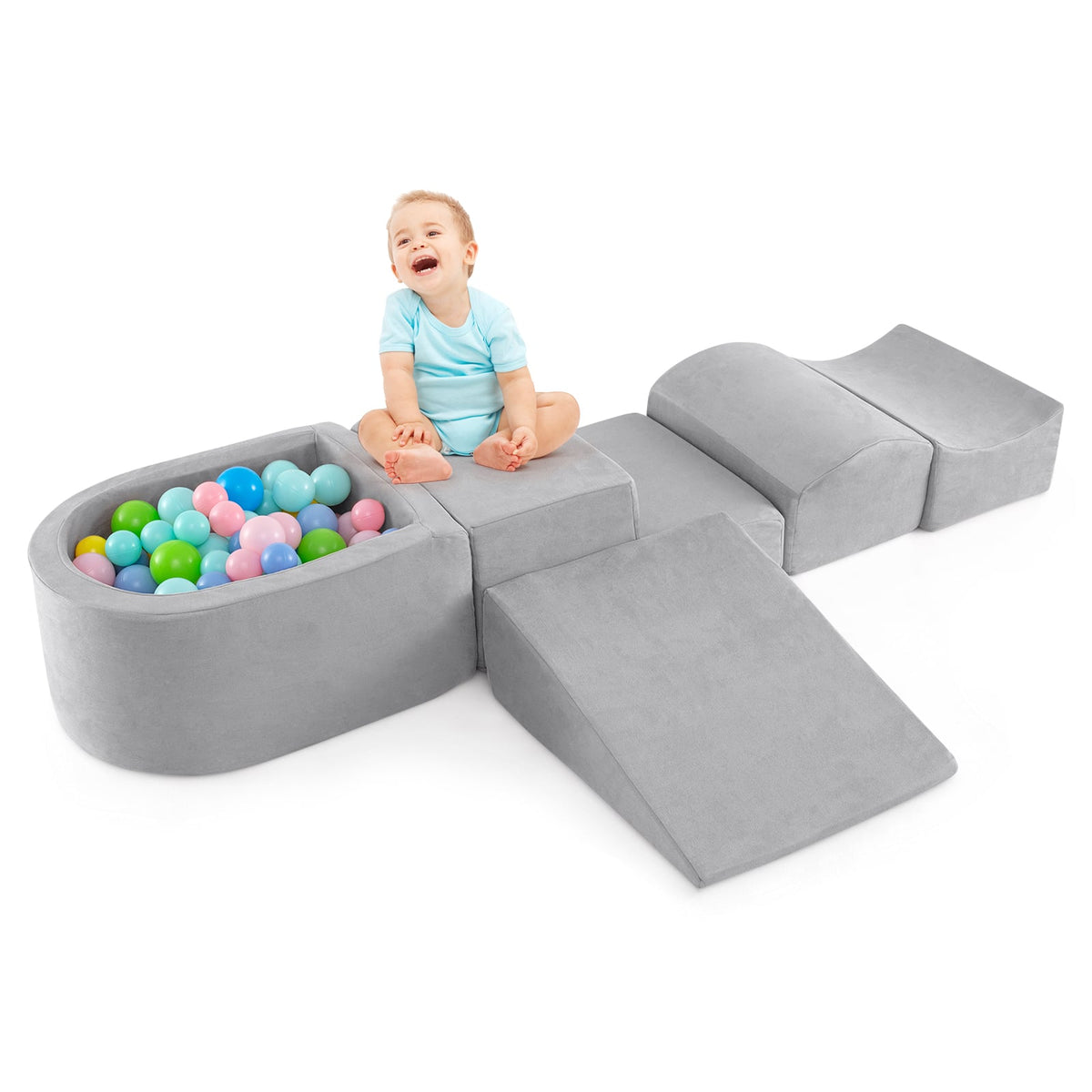 5-Piece Climb and Crawl Playset with a ball pit and a happy baby sitting on the grey foam blocks