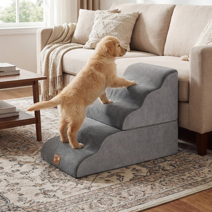 the pet ramp positioned beside a sofa with a puppy climbing onto the furniture